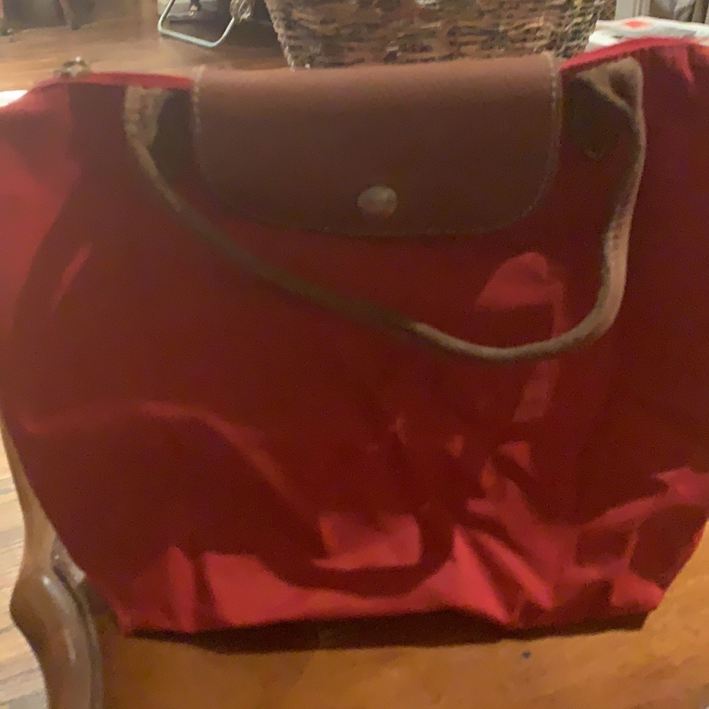 Red Longchamp Pliage small short handle bag